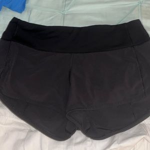 Black Lululemon speed-up shorts. Length 2.5. Size 4